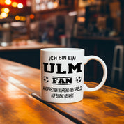 Fussball Tasse | Ich bin ein Ulm Fan - Ansprechen während des Spiels auf eigene Gefahr | Keramiktasse für Fußballfans