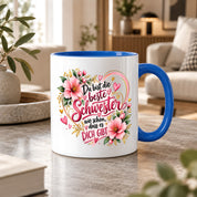 Herzbotschaft Schwester Tasse – Du bist die beste Schwester, wie schön dass es dich gibt – Kaffeetasse 330 ml mit rosa Blumen und Herzen – Geschenk für Schwester zum Geburtstag, Weihnachten, als Dankeschön oder kleine Aufmerksamkeit