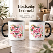 Herzbotschaft Schwester Tasse – Du bist die beste Schwester, wie schön dass es dich gibt – Kaffeetasse 330 ml mit rosa Blumen und Herzen – Geschenk für Schwester zum Geburtstag, Weihnachten, als Dankeschön oder kleine Aufmerksamkeit