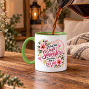 Herzbotschaft Schwester Tasse – Du bist die beste Schwester, wie schön dass es dich gibt – Kaffeetasse 330 ml mit rosa Blumen und Herzen – Geschenk für Schwester zum Geburtstag, Weihnachten, als Dankeschön oder kleine Aufmerksamkeit