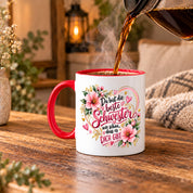 Herzbotschaft Schwester Tasse – Du bist die beste Schwester, wie schön dass es dich gibt – Kaffeetasse 330 ml mit rosa Blumen und Herzen – Geschenk für Schwester zum Geburtstag, Weihnachten, als Dankeschön oder kleine Aufmerksamkeit