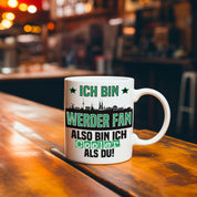 Tasse mit Motiv - Ich bin Werder Fan also bin ich cooler als du! | Bremen Fußball Keramiktasse | Skyline deiner Stadt