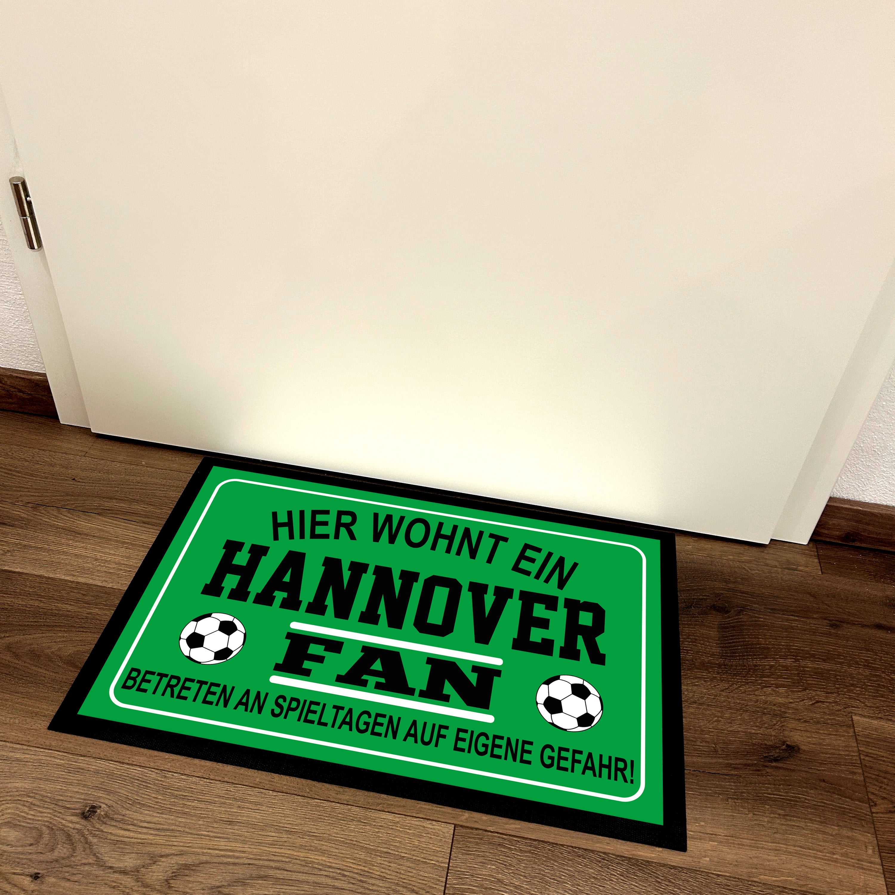 Fußmatte für Fußball Fans - Hier wohnt ein Hannover Fan - Betreten an Spieltagen auf eigene Gefahr! - für innen und außen | 60x40cm