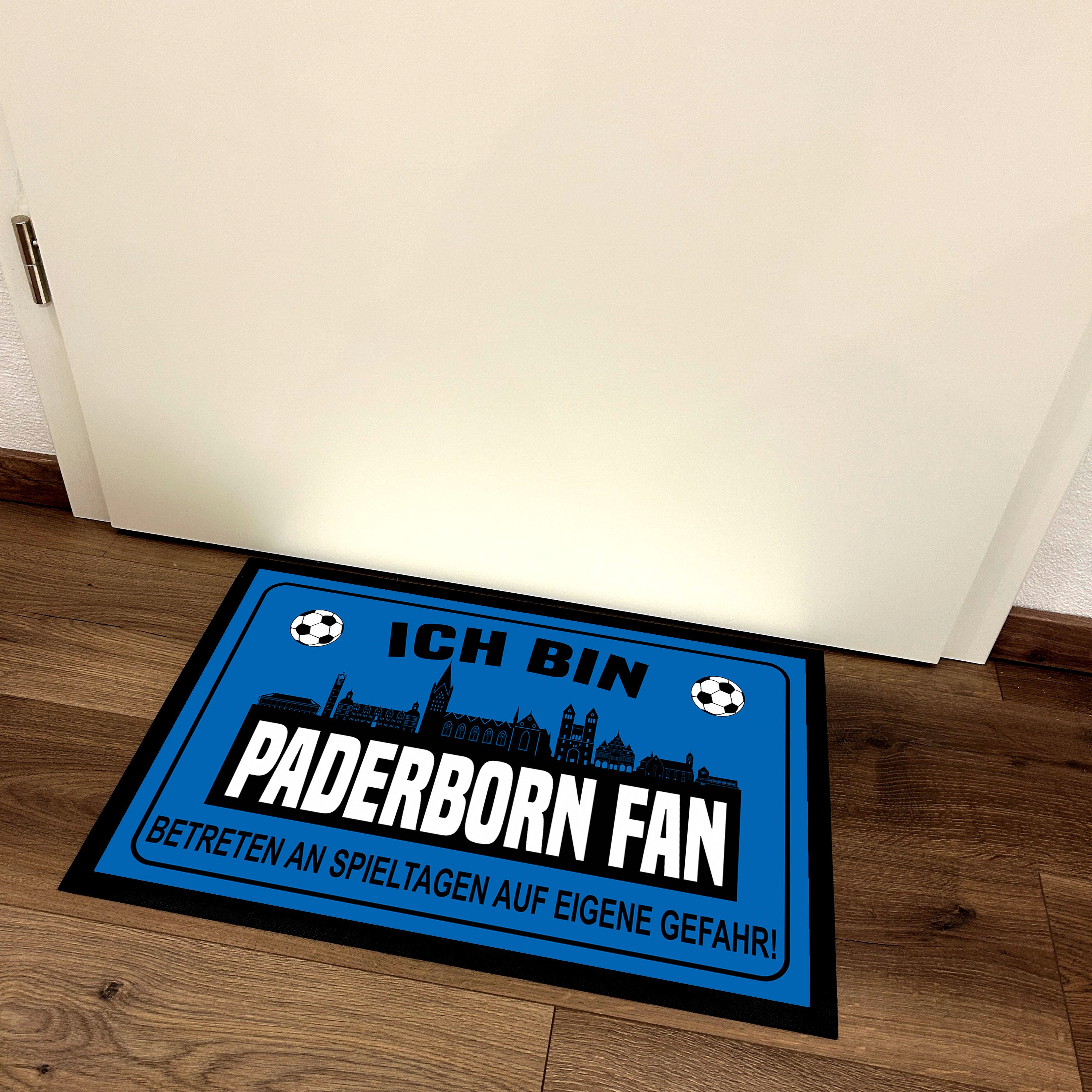 Fußmatte für Fußballfans mit Skyline | 60x40cm | Ich bin Paderborn Fan - Betreten an Spieltagen auf eigene Gefahr! | Zeige deine Stadtliebe und Fußballbegeisterung! | für innen und außen