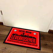 Fußmatte für Fußballfans mit Skyline | 60x40cm | Ich bin Leverkusener - Betreten an Spieltagen auf eigene Gefahr! | Zeige deine Stadtliebe und Fußballbegeisterung! | für innen und außen