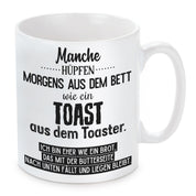 Tasse mit Motiv - Manche hüpfen morgens aus dem Bett wie ein Toast aus dem Toaster...