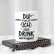 Tasse mit Motiv - Du siehst so aus als könnte ich einen Drink vertragen!